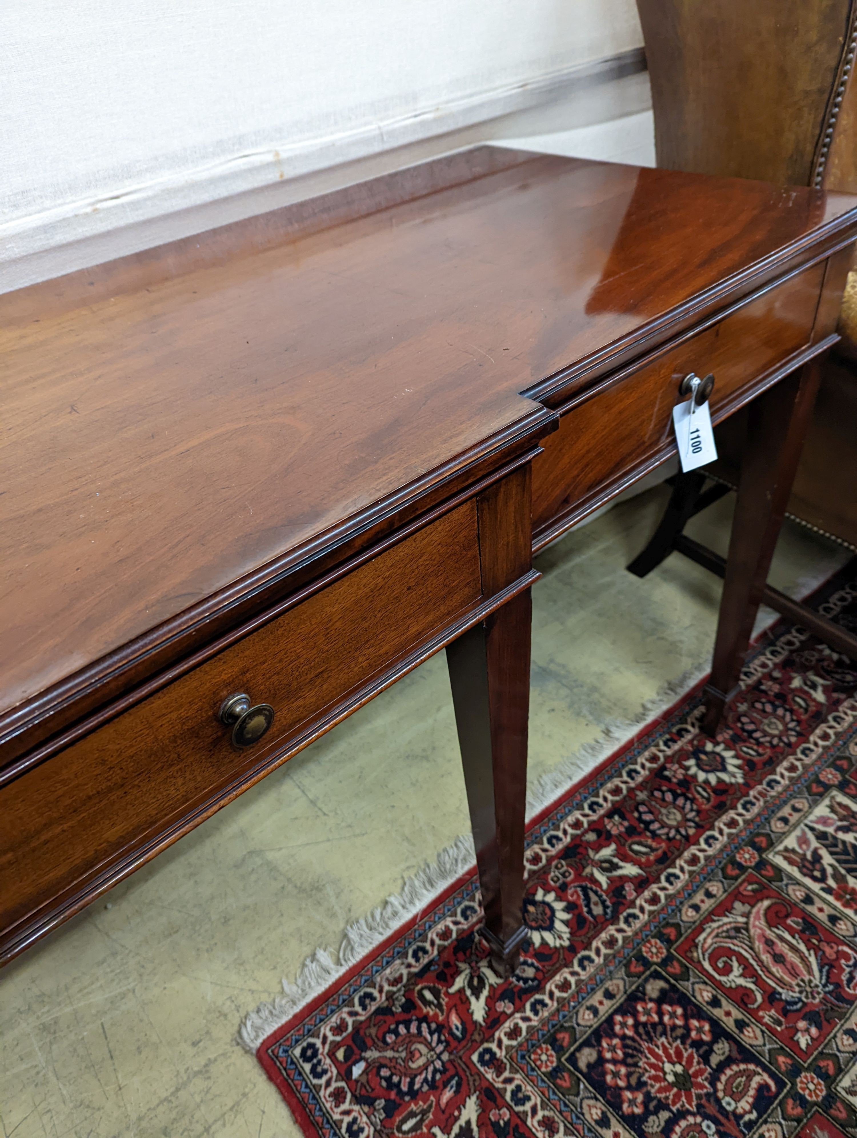 An Edwardian mahogany break front serving table by Howard & Son, London, width 214cm, depth 60cm, height 85cm